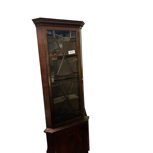 353 - Edwardian mahogany corner cabinet with astragal glazed door on cupboard base.