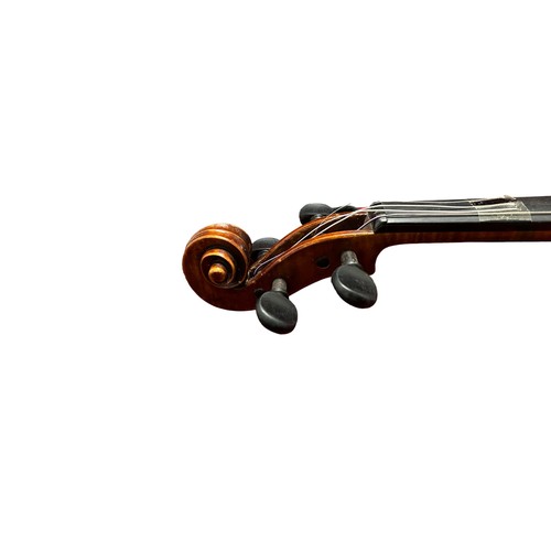 88 - A 20th century violin by Carlo Storioni, length of back 361mm, interior label dated 1902, with Hisco... 