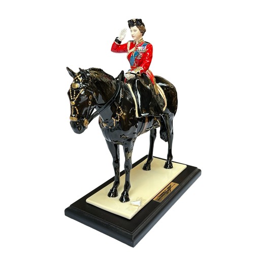 224 - A COALPORT LIMITED EDITION 'TROOPING THE COLOUR' FIGURINE, depicting Her Majesty The Queen on horseb... 