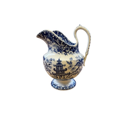 222 - 19th Century Blue & White Jug decorated in an oriental design