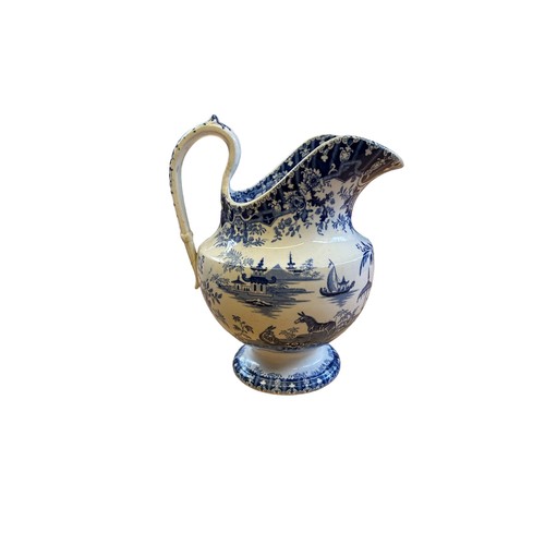 222 - 19th Century Blue & White Jug decorated in an oriental design