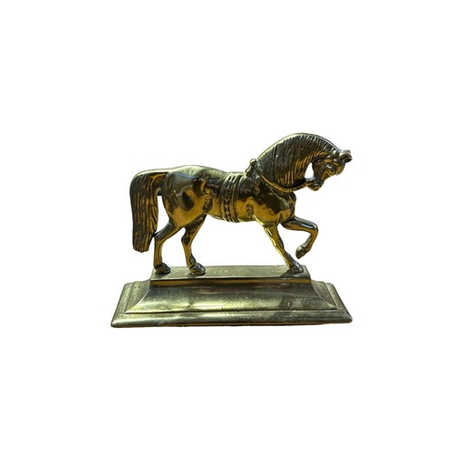 64 - Brass heavy horse door stops c.22cm tall x 29cm long.