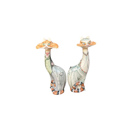 254 - David Sharp for Rye Cinque Ports Pottery: Two Large Figures Bride and Groom, modelled as cats with p... 