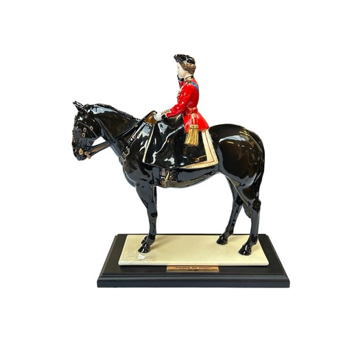 82 - A COALPORT LIMITED EDITION 'TROOPING THE COLOUR' FIGURINE, depicting Her Majesty The Queen on horseb... 