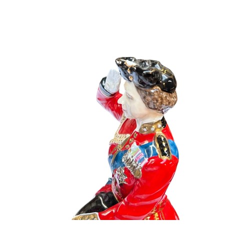 82 - A COALPORT LIMITED EDITION 'TROOPING THE COLOUR' FIGURINE, depicting Her Majesty The Queen on horseb... 