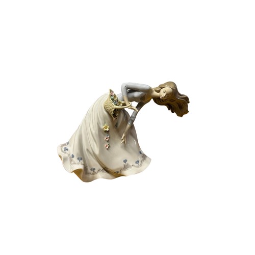 74 - A LLADRO PORCELAIN FIGURE, 'Petals on the Wind' model no 06767 boxed a current issue, height 23cm (C... 