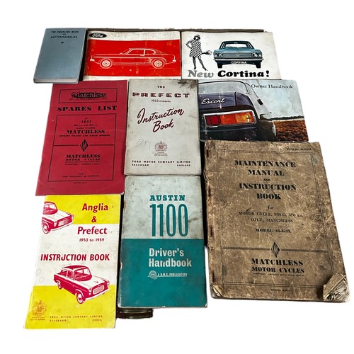 105 - Shell petrol can & a collection of Car Handbooks