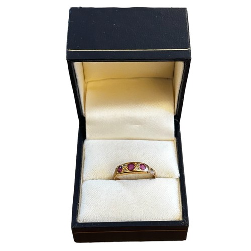 182 - 18ct Gold set Three Ruby ring 1.7g gross approx size L