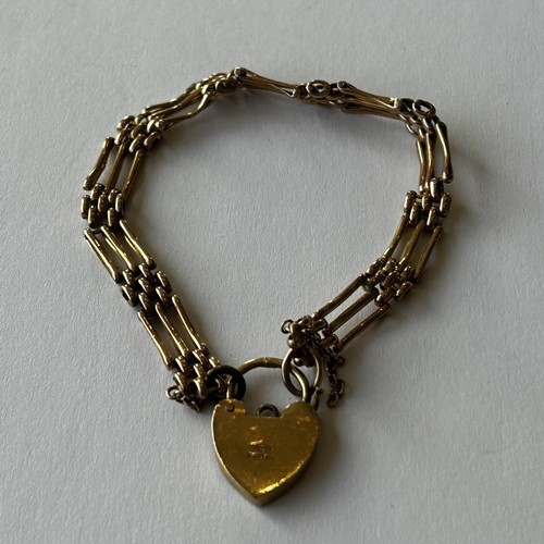 65 - 9ct Gold Gate Bracelet with heart lock 8.6g c.17cm