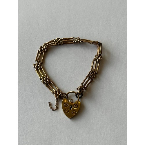 65 - 9ct Gold Gate Bracelet with heart lock 8.6g c.17cm