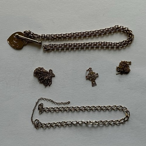 63 - Four 9ct Gold Chains, one with a heart pendant & one with a crucifix - 9.3g (4) fine chain AF