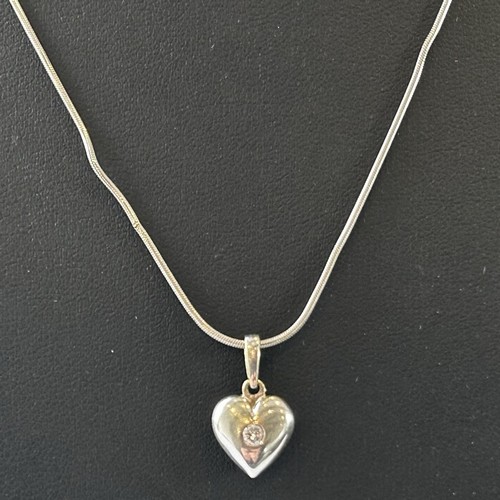 104 - 9ct White Gold Necklace with a Heart Shaped Pendant (5.4g)