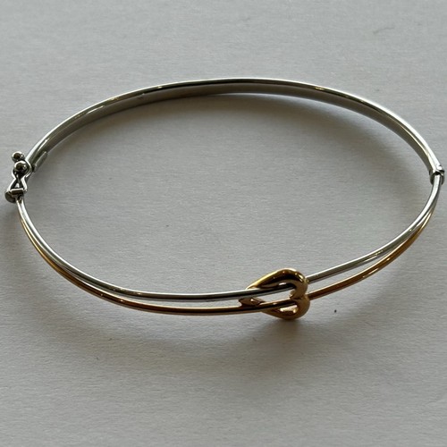 46 - Two 9ct Gold Bangles, one stone set (2) 11.1g gross