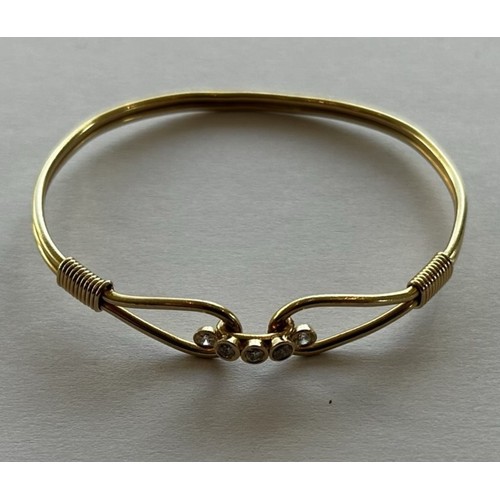 33 - A 14ct Gold Bangle 8.4g