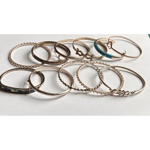 123 - A Collection of Silver Bangles (11) 100.8g