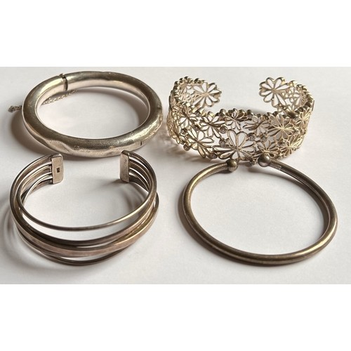 127 - A Collection of Silver Bangles (4) 101.5g