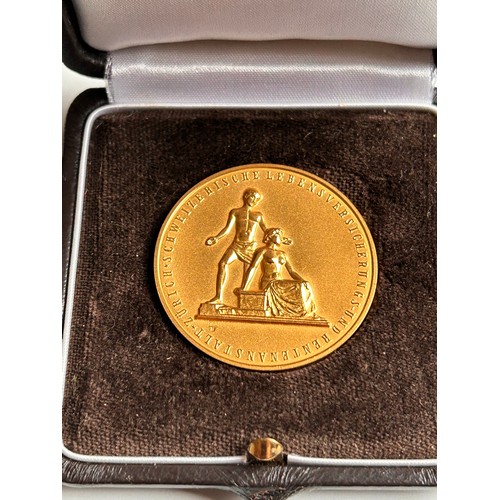 2 - Unusual 18ct Gold Service Medal, given to the Vendor for 25 years service with the company
Stamped 7... 