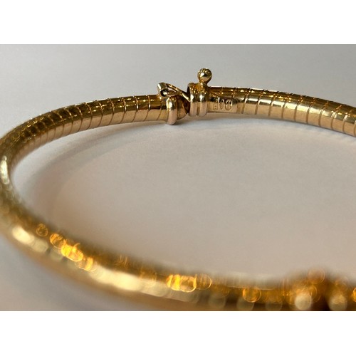 100 - A 9ct Gold Bangle 4.8g