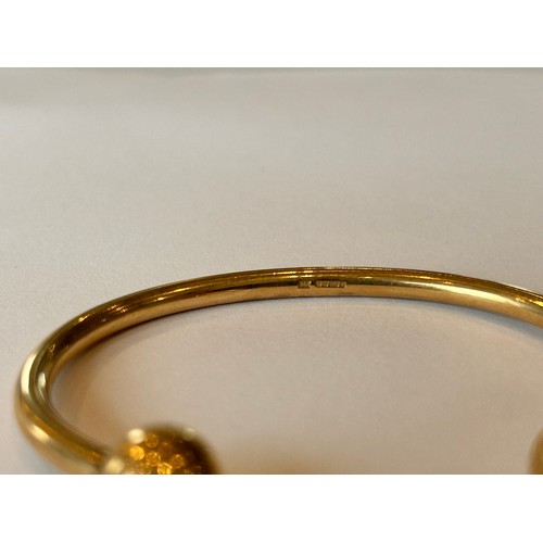 46 - A 9ct Gold Bangle 17.8g