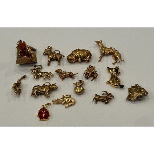 33 - Collection of 9ct Gold Charms - 43.5g gross