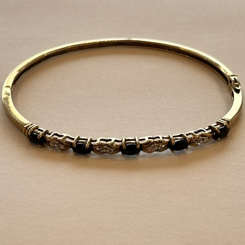 31 - 9ct Gold Diamond & Sapphire Set Bangle (7.6g gross)