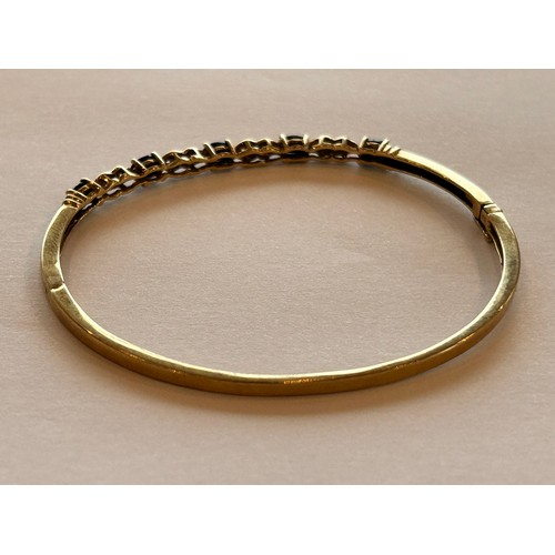 31 - 9ct Gold Diamond & Sapphire Set Bangle (7.6g gross)