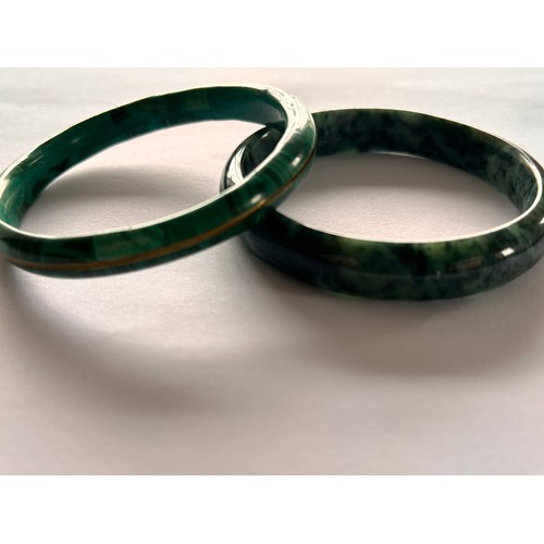 147 - Two Jade Bangles