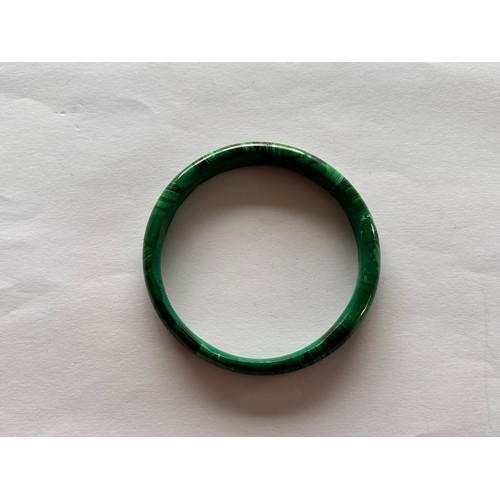 147 - Two Jade Bangles