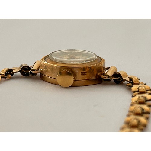 180 - 9ct Gold Ladies Watch on plated strap 9.6g gross