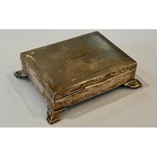 244 - A Silver Cigarette Desk Case, by E J Trevitt & Sons, Birmingham 1937 (af) 248.5g gross