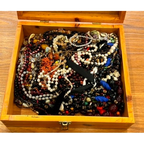 189 - A Large Collection of Costume / Dress Jewellery in a large wooden box