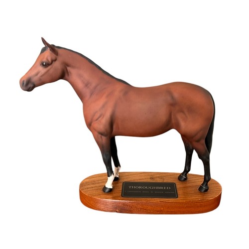 321 - Beswick Connoisseur Collection 'Thoroughbred' raised on an oval plinth base,