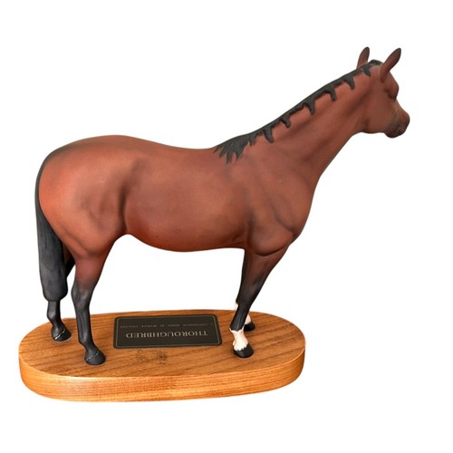 321 - Beswick Connoisseur Collection 'Thoroughbred' raised on an oval plinth base,