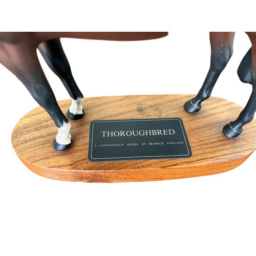 321 - Beswick Connoisseur Collection 'Thoroughbred' raised on an oval plinth base,