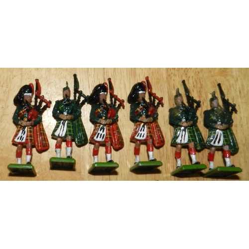 137 - BRITAIN'S. (6) Various metal pipers. Also box of mixed plasic soldiers,