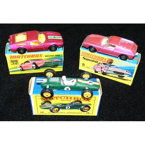 262 - MATCHBOX. (3) 5e Lotus Europa, pink; 19d Lotus racing car, dark green; 32d Maserati Bora, crimson/gr... 