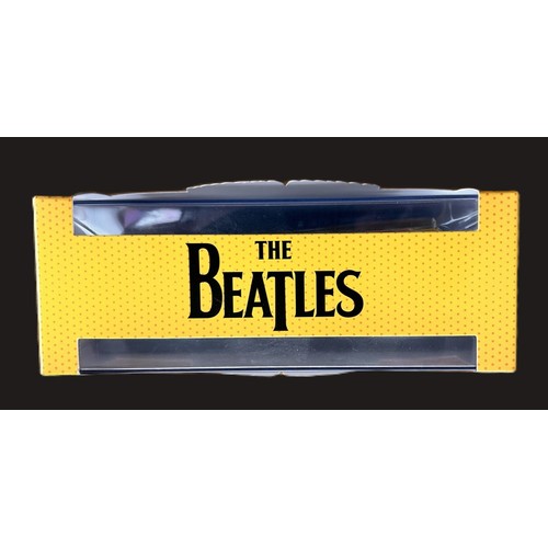 195 - A Corgi branded die cast Beatles Magical Mystery Tour Bus complete in original packaging