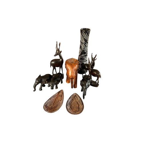 197 - A Collection of Carved Wooden Animals & Soap Stone items