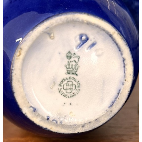 154 - Three Royal Doulton Vases (3) a pair of Royal Doulton 'Blue Children' Vases and another larger examp... 