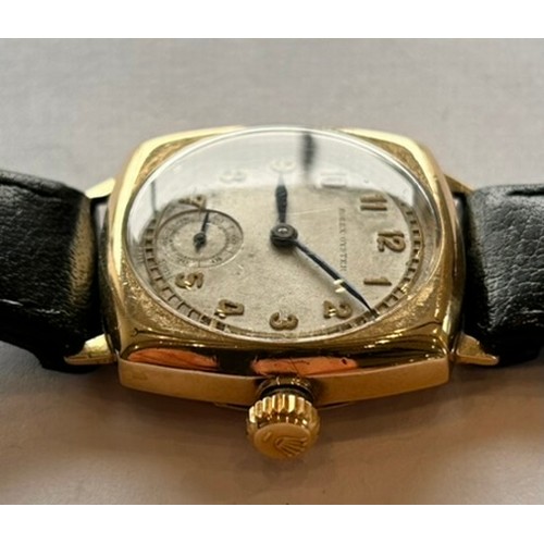 76 - Rolex - A Vintage Gold Oyster Wristwatch, the circular dial in a cushion shaped case signed Rolex, w... 