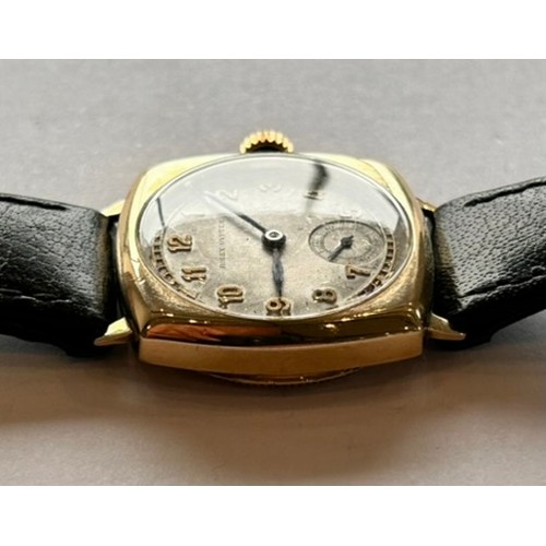 76 - Rolex - A Vintage Gold Oyster Wristwatch, the circular dial in a cushion shaped case signed Rolex, w... 