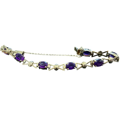 67 - 9ct Gold & Amethyst Stone Set Bracelet (14.5g)
Seven Amethyst Stones