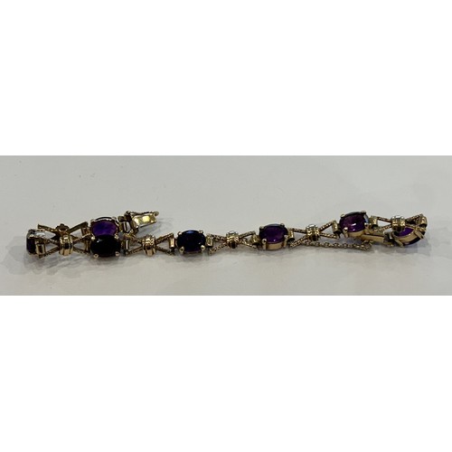 67 - 9ct Gold & Amethyst Stone Set Bracelet (14.5g)
Seven Amethyst Stones