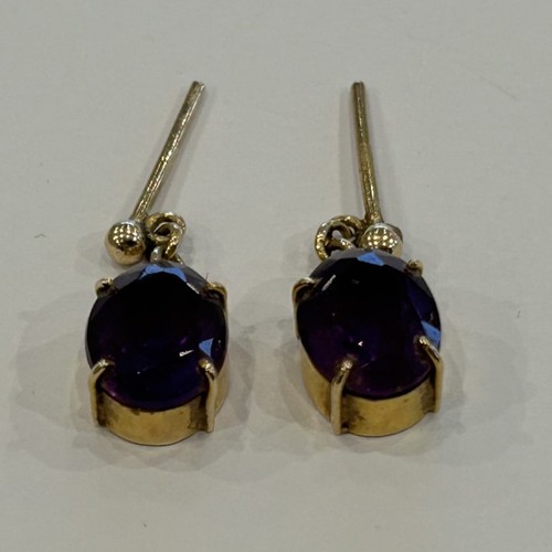 115 - Yellow Metal Set Amethyst Earrings (2.1g gross)