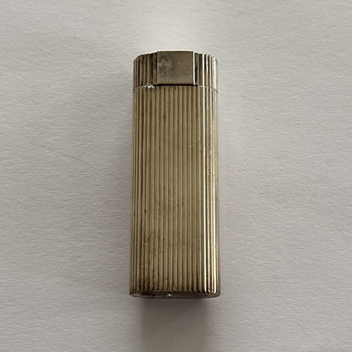 68 - Must de Cartier, engine turned pocket lighter with box, 7cm