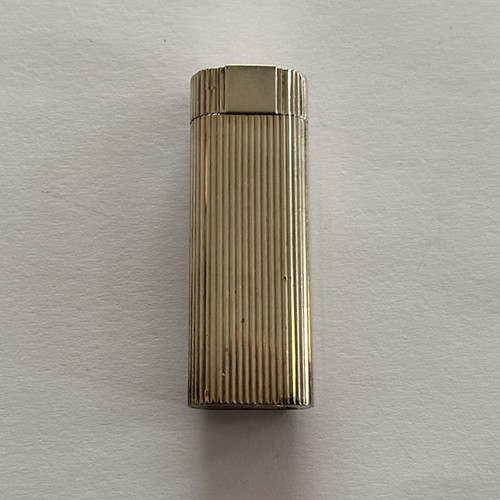 68 - Must de Cartier, engine turned pocket lighter with box, 7cm