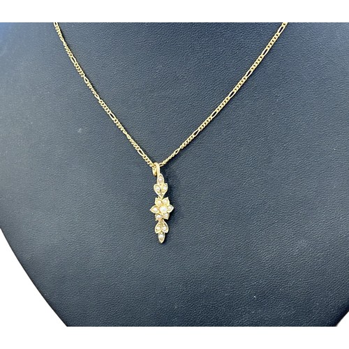 76 - 9ct Gold Necklace with Seed Pearl set pendant in the form of a flower 3.4g