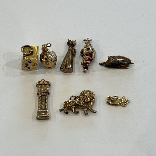 50 - Eight 9ct Gold Charms (8) 12.0g