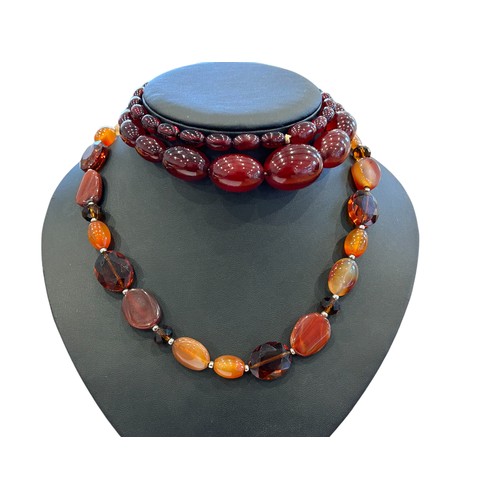 108 - Graduating cherry amber style bead necklace 51.0g, also another necklace (2)