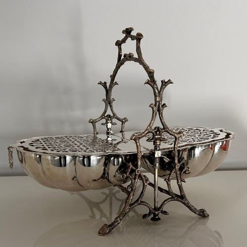 9 - A Victorian Silver Plated Clam Shell Muffin Warmer. Walker & Hall, Sheffield. 24.5cm high.